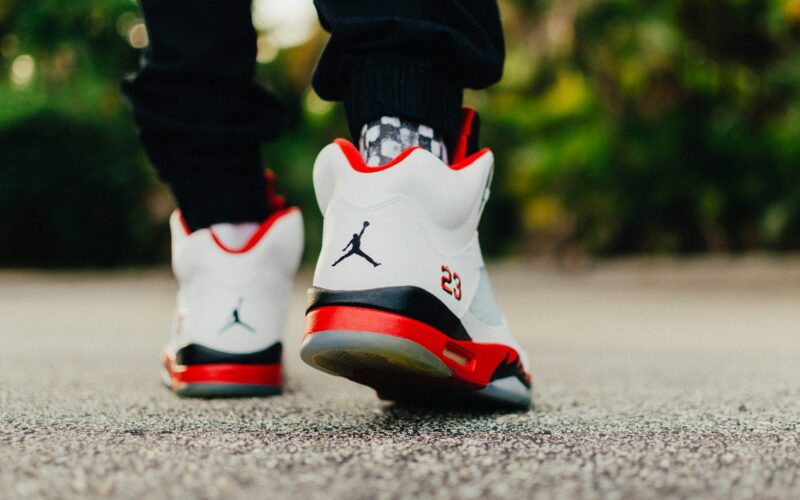 Image of a person walking with air jordans